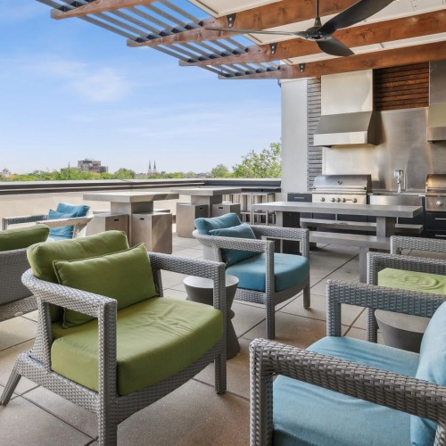 State-of-the-art amenities a deck with chairs and a table